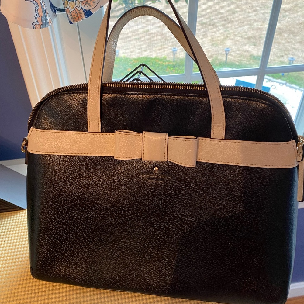 Kate Spade some bag in black with adorable ivory bow accent.